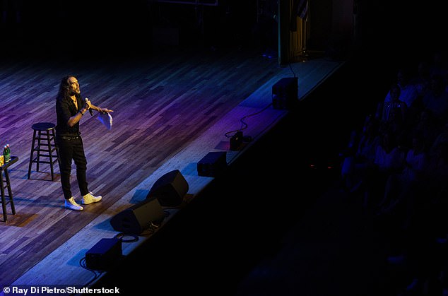 Comedian Russell Brand Critiques Biden’s Re-Election Bid in Podcast Discussion